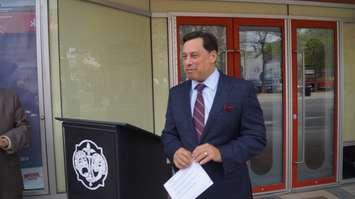 Minister Brad Duguid used the Imperial Theatre as a backdrop for his announcement  of an Ontario accessibility certification program Friday morning. May 29, 2015. (BlackburnNews.com Photo by Briana Carnegie)
