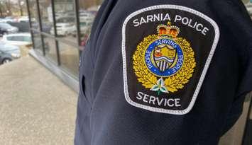 Sarnia Police Service patch on a officer's uniform. April 2023. (Photo by Melanie Irwin)