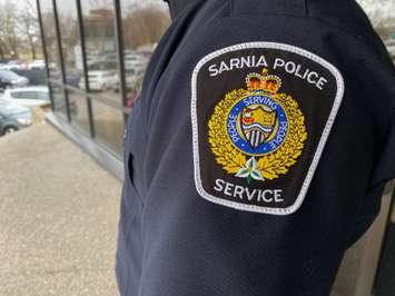 Sarnia Police Service patch on an officer's uniform. April 2023. (Photo by Melanie Irwin)