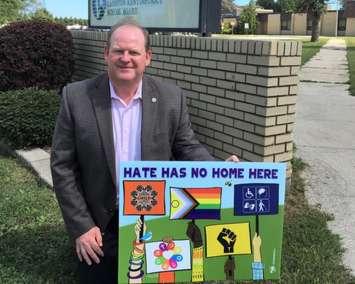 LKDSB  Director of Education John Howitt with a "Hate Has No Home Here" sign.  (Photo courtesy of LKDSB via Twitter)