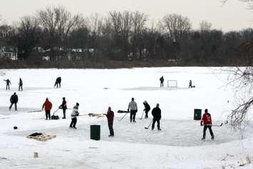 Skaters take advantage of a frozen Lake Chipican in Canatara Park. February 2015 (BlackburnNews.com photo by Dave Dentinger)