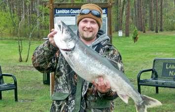 Justin Tadgell and his 20.80 lb Lake Trout. (submitted photo)
