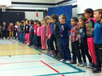 Students at West Gate Public School sing a song called "Differences," at a Black History Month assembly, February 2, 2016. (Photo by Mike Vlasveld)