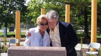 An emotional moment at the official opening for Cox Park when Mayor Mike Bradley and Norma Cox unveil the memorial for the late Mary-Ann Clark. June 24, 2015 (BlackburnNews.com Photo by Briana Carnegie)
