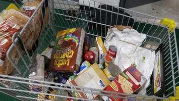 A shopping cart from the Irish Miracle Food Drive rally at St. Patrick's Catholic School in Sarnia. (Photo by Colin Gowdy, 28 Nov 2017)