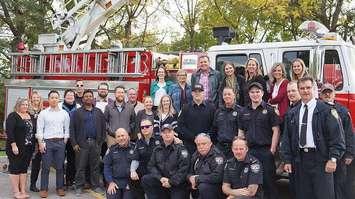 Central Lambton Family Health Team poses with firefighters (Photo courtesy of Currie Emergency Photography)