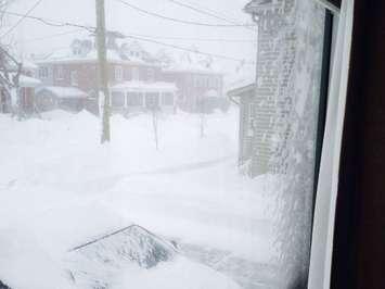 A look outside of a window in blizzard conditions.  Photo courtesy of Mark Rush.